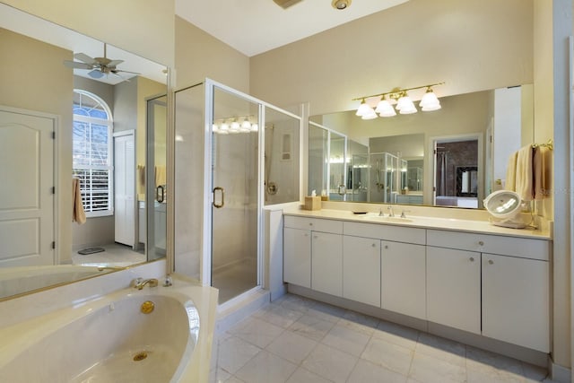 bathroom featuring tile patterned flooring, vanity, a ceiling fan, a bath, and a stall shower