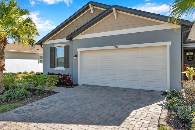 view of front of home with a garage