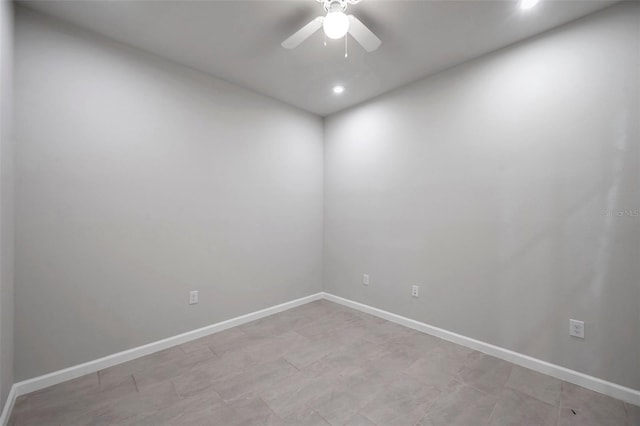 spare room with ceiling fan, recessed lighting, and baseboards