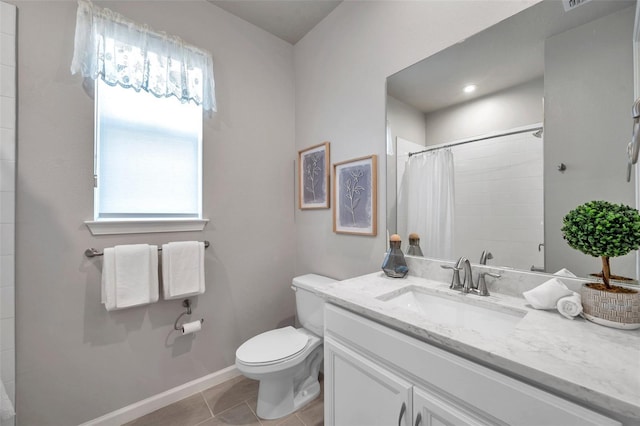 bathroom featuring tile patterned flooring, vanity, a shower with curtain, and toilet