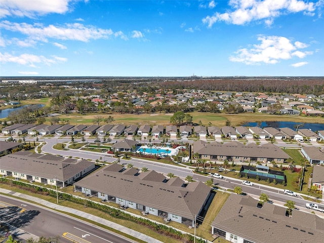 bird's eye view featuring a residential view, a water view, and golf course view