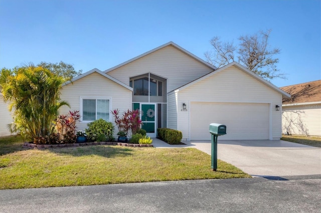 single story home with a garage and a front yard