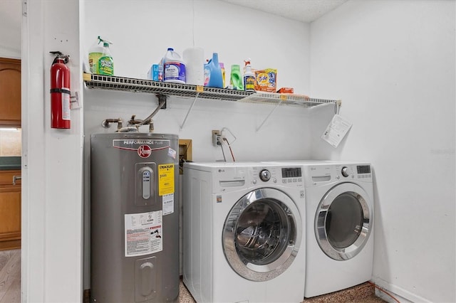 clothes washing area featuring washer hookup and electric water heater