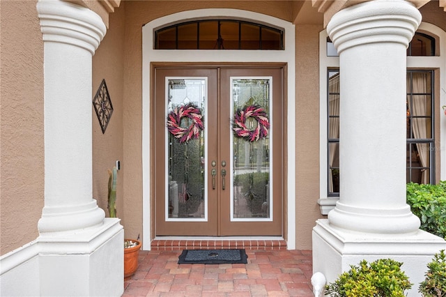 property entrance featuring french doors