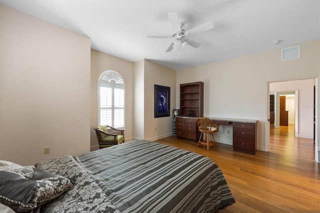 bedroom featuring ceiling fan and light wood-type flooring