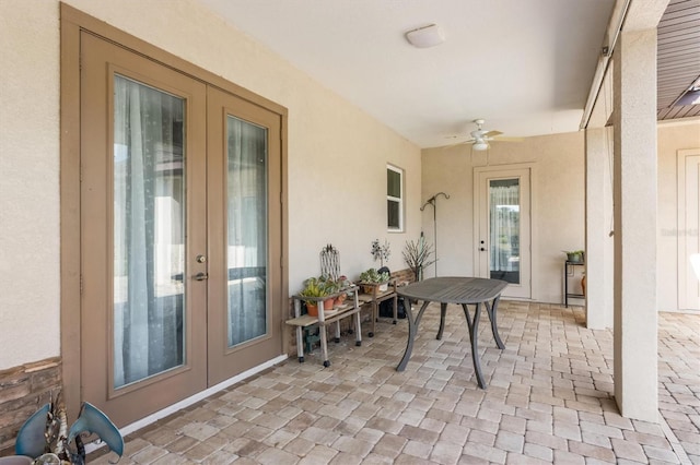 view of patio with ceiling fan and french doors