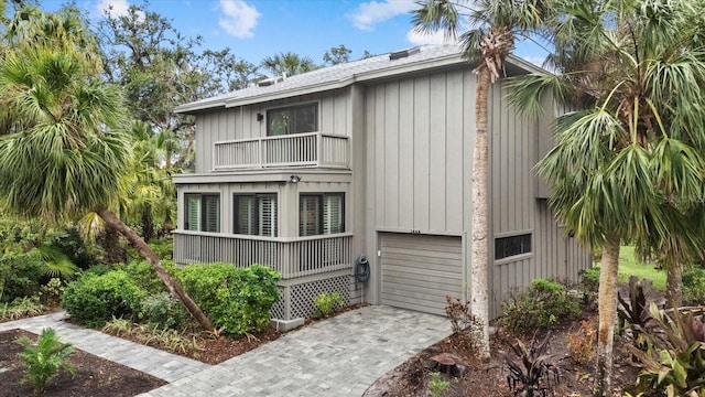 view of property exterior featuring a balcony