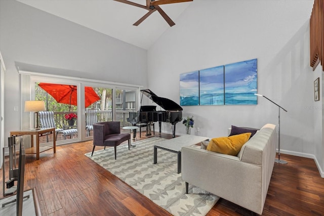 living room with ceiling fan, wood-type flooring, and high vaulted ceiling