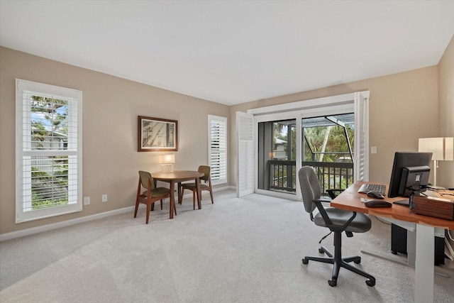 office area with light colored carpet