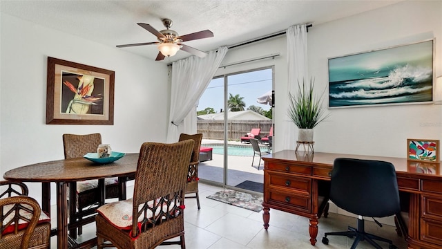 office featuring ceiling fan and a textured ceiling