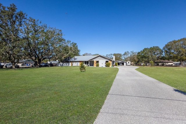 view of front of home with a front yard