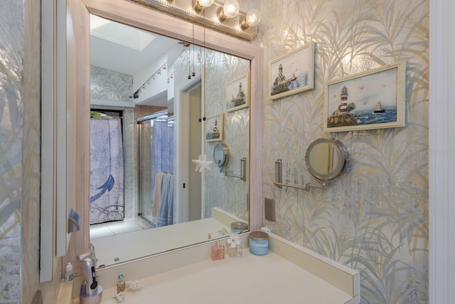 bathroom featuring a skylight