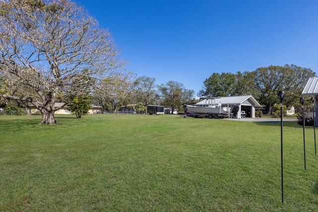 view of yard featuring a carport