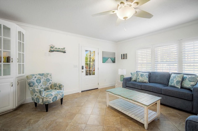 living room with crown molding, light tile patterned floors, and ceiling fan