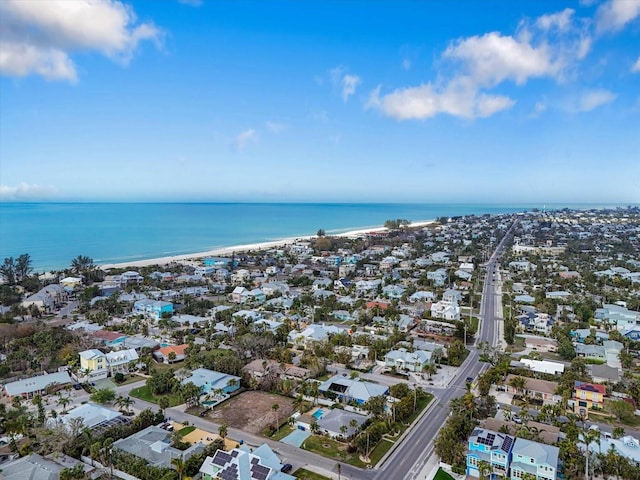 aerial view featuring a water view and a view of the beach