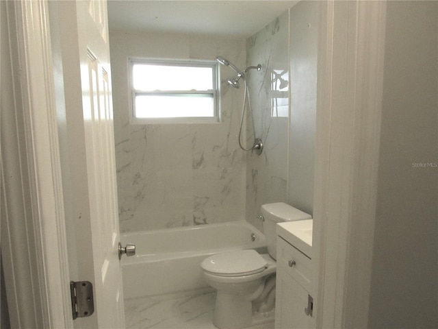 full bathroom with vanity, toilet, and tiled shower / bath combo