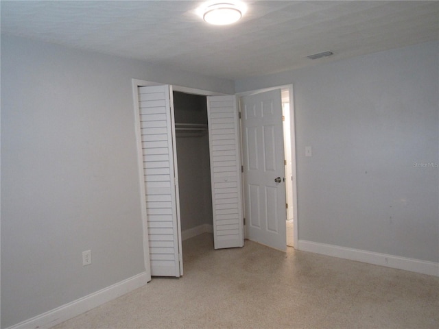 unfurnished bedroom featuring a closet