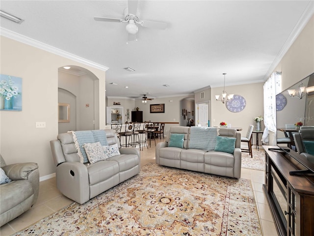 tiled living room featuring crown molding and ceiling fan with notable chandelier