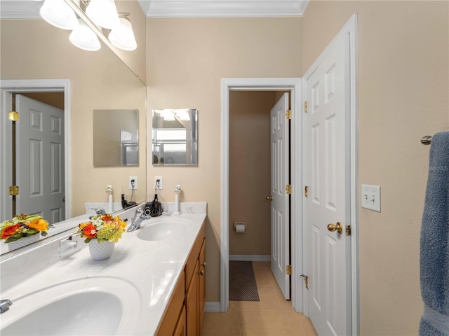 bathroom featuring tile patterned flooring, vanity, and ornamental molding