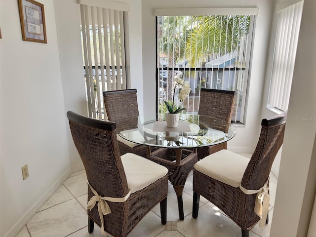 dining room with light tile patterned floors