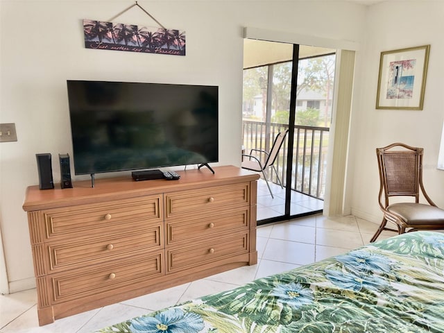 tiled bedroom with access to exterior