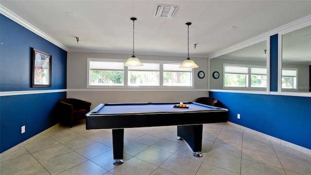 rec room with light tile patterned floors and crown molding