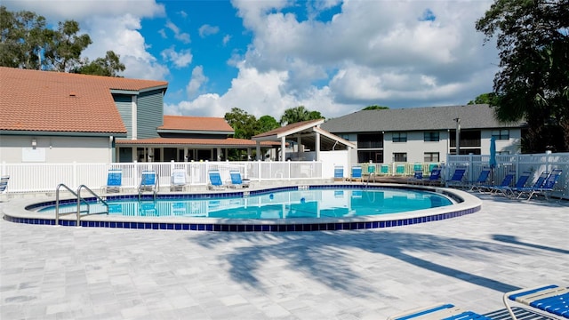 view of pool with a patio area