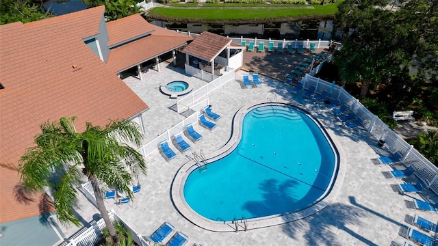 view of swimming pool with a gazebo, a patio area, and a hot tub