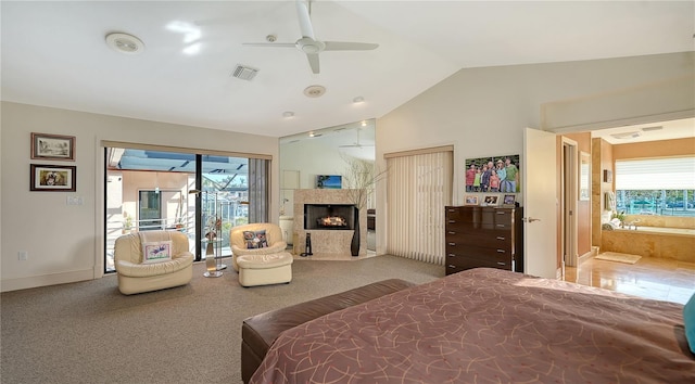 carpeted bedroom featuring ceiling fan, access to exterior, and vaulted ceiling