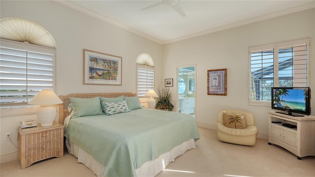 bedroom with ornamental molding, carpet floors, connected bathroom, and ceiling fan