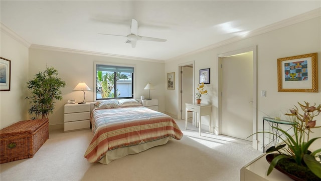 carpeted bedroom with crown molding and ceiling fan