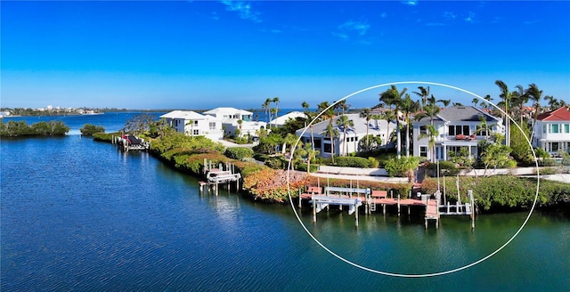 water view featuring a dock