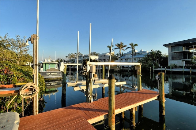 dock area with a water view