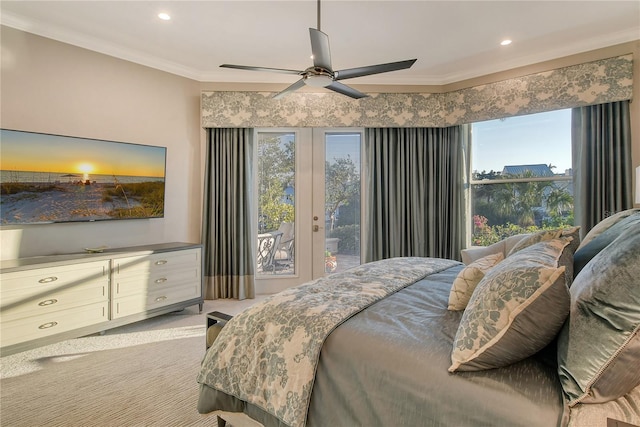 carpeted bedroom with ceiling fan, ornamental molding, and access to exterior