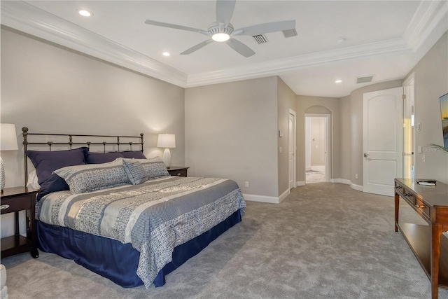 bedroom featuring crown molding, light carpet, and ceiling fan