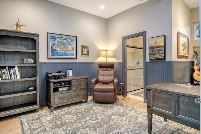 sitting room featuring light hardwood / wood-style flooring