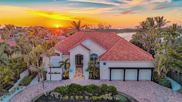 view of front of property featuring a garage