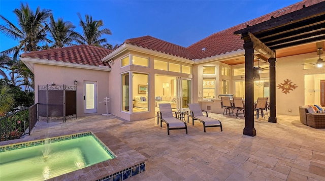 400 N Washington Dr, Sarasota, FL 34236 - rear view of property featuring a tile roof, a patio area, ceiling fan, and stucco siding