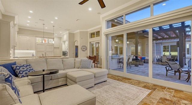 400 N Washington Dr, Sarasota, FL 34236 - living area with ceiling fan, ornamental molding, recessed lighting, stone tile flooring, and a towering ceiling