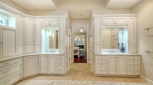 400 N Washington Dr, Sarasota, FL 34236 - ensuite bathroom featuring two vanities and tile patterned floors