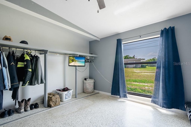 interior space featuring ceiling fan