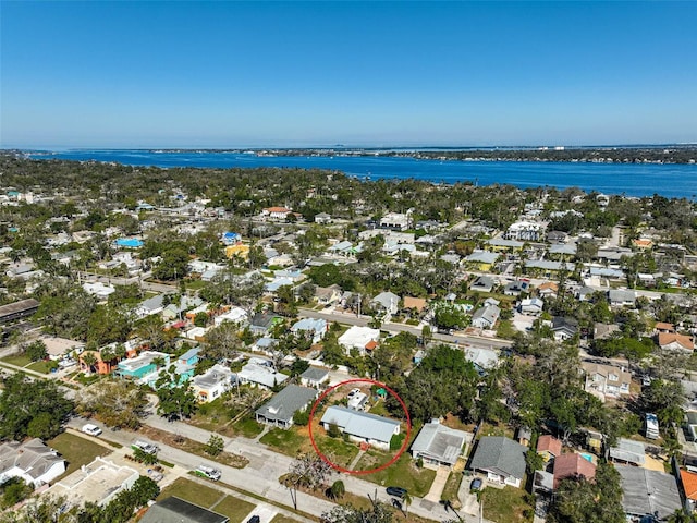 aerial view featuring a water view and a residential view