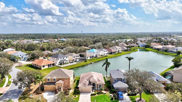 aerial view featuring a water view and a residential view