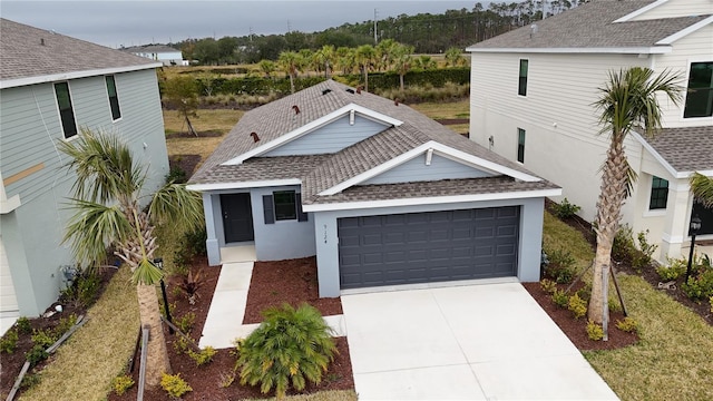 view of front of property with a garage