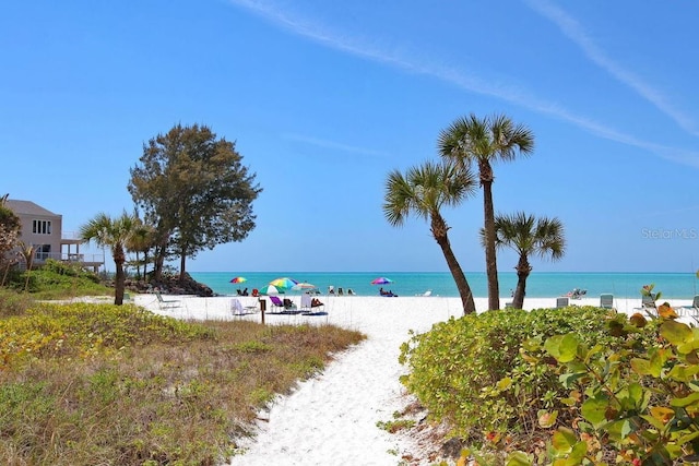 property view of water featuring a beach view