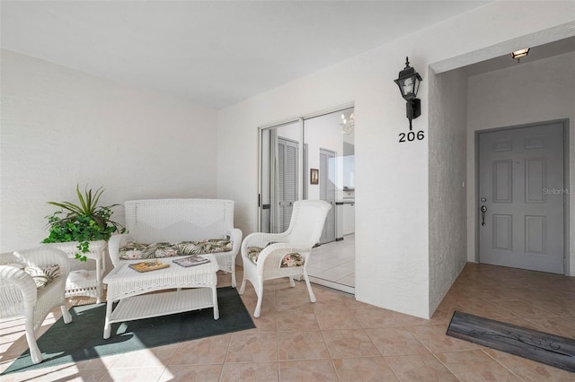 sitting room featuring light tile patterned flooring