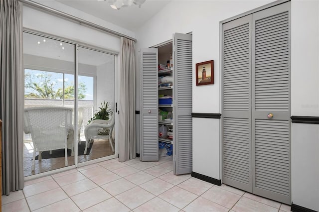 interior space with light tile patterned floors