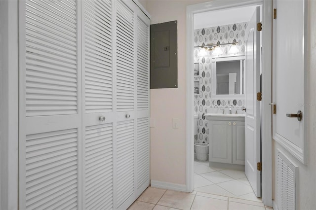 bathroom with tile patterned floors and electric panel