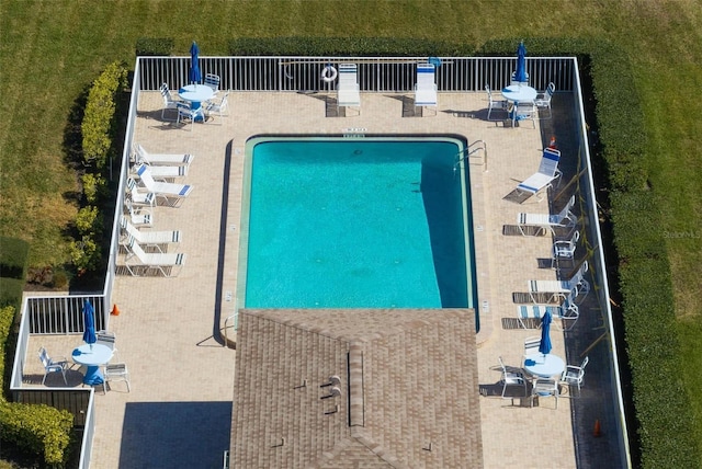 view of swimming pool featuring a patio