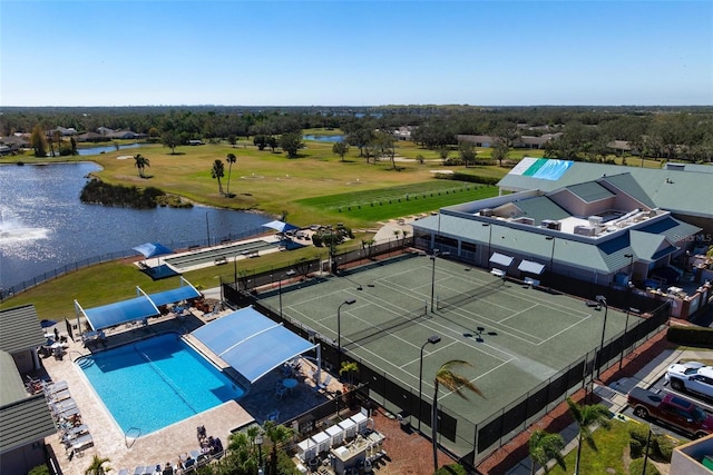 bird's eye view with a water view